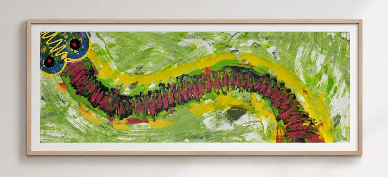 A long yellow and green wave with a dark spine, in a pale oak frame