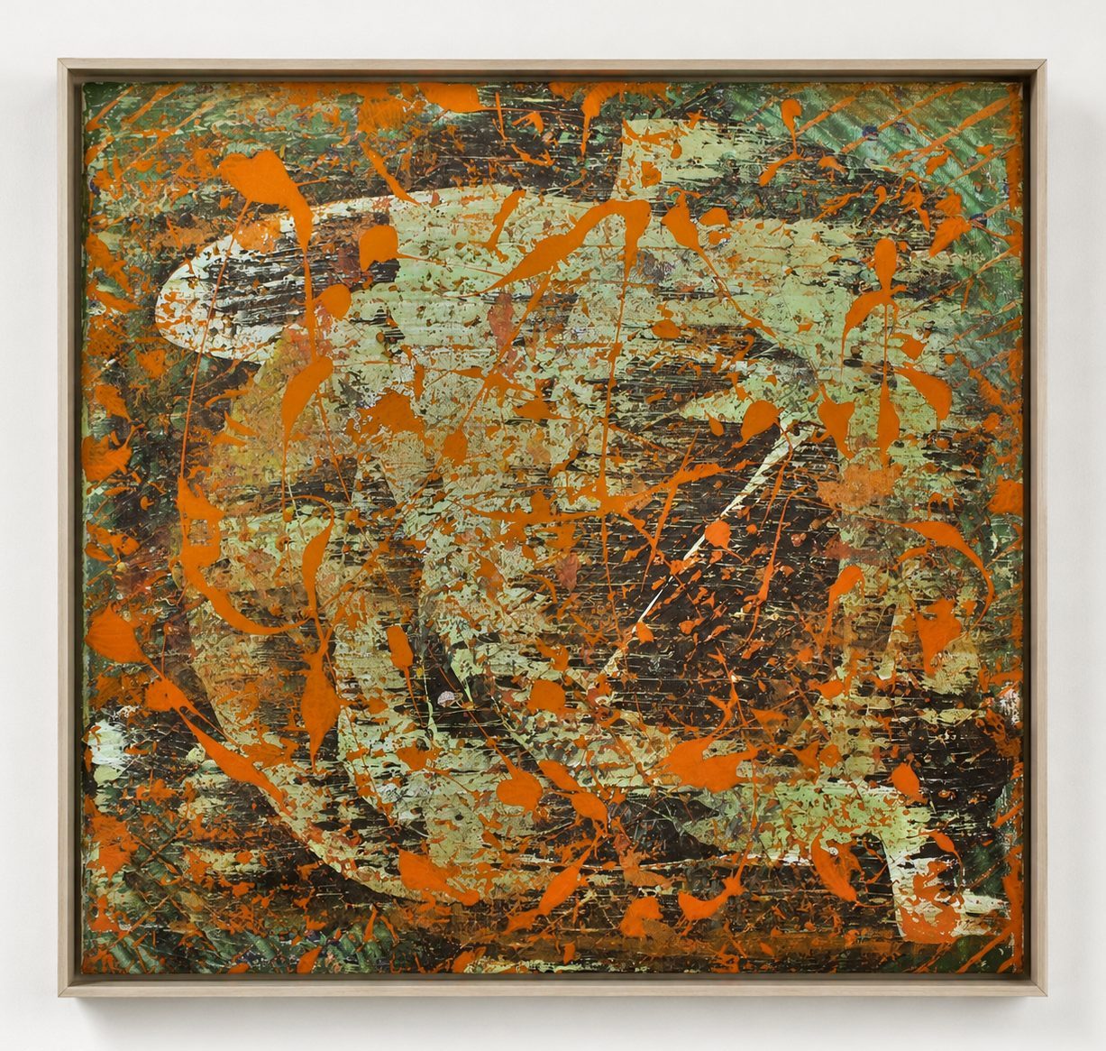 Rust and ochre marks over a green ground, in a pale oak frame