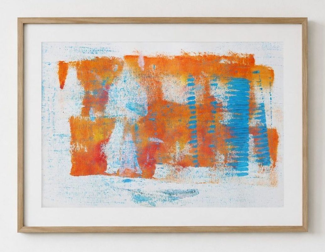An orange and blue print with combed blue strokes, in an oak frame