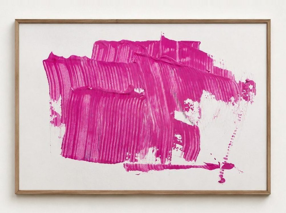 A magenta combed painting on paper, in an oak frame
