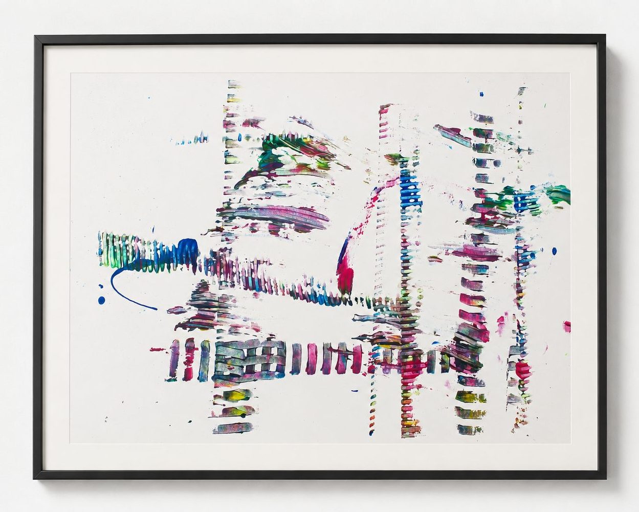 Small coloured dashes scattered over white paper, in a black frame