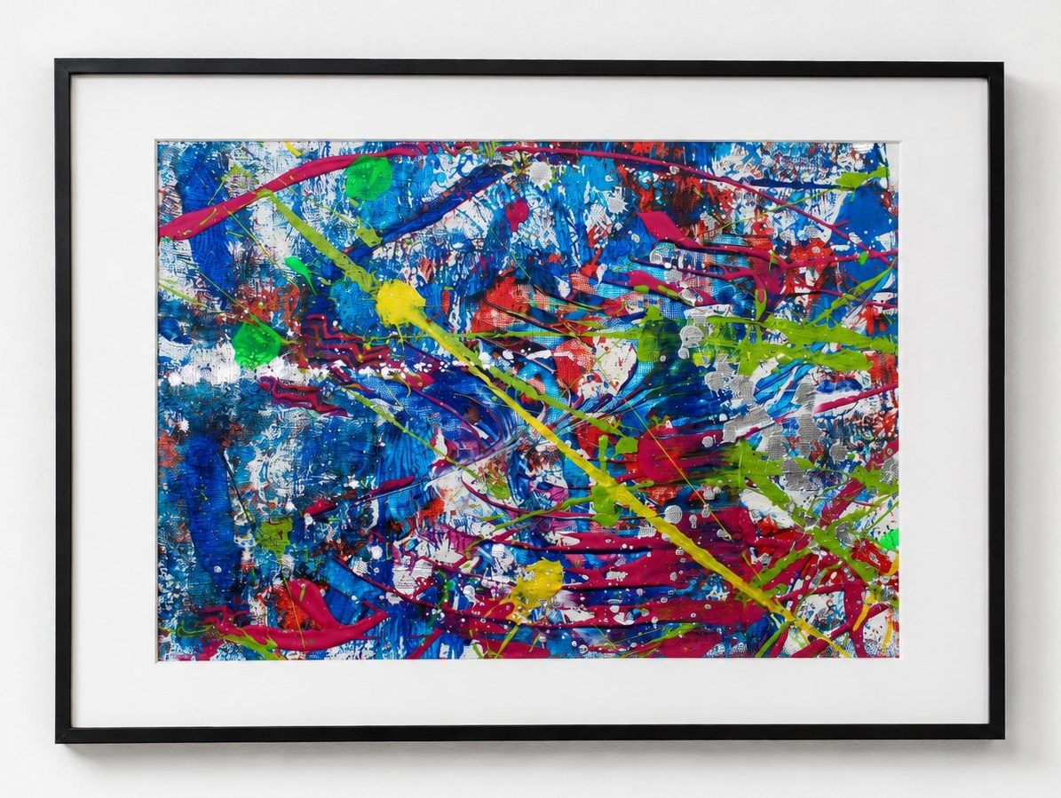 Blue and red spatter with yellow lines, in a black frame