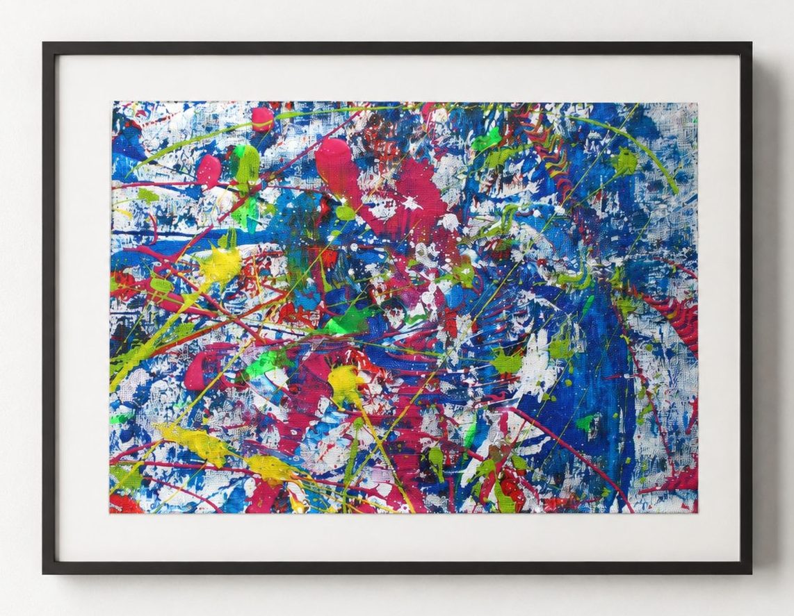 Blue and crimson spatter on paper, in a black frame