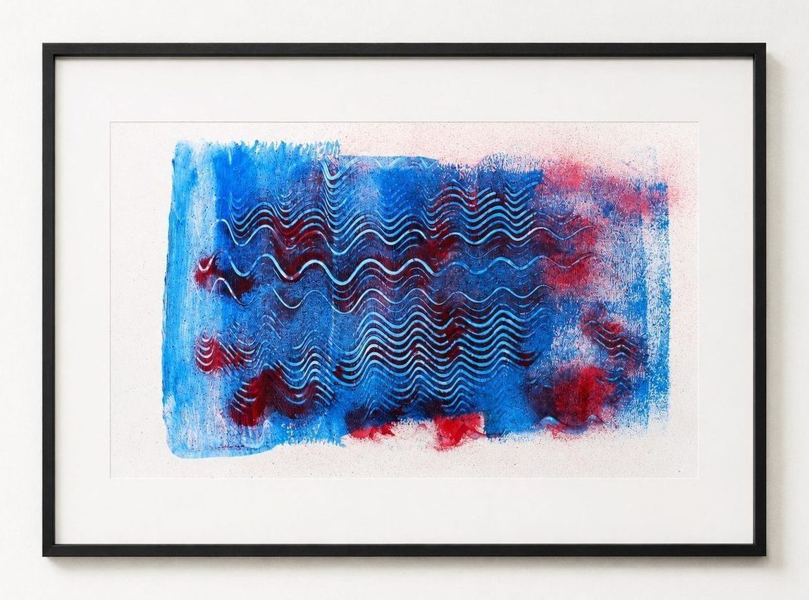 A bright blue work on paper with dark red combed waves, in a black frame