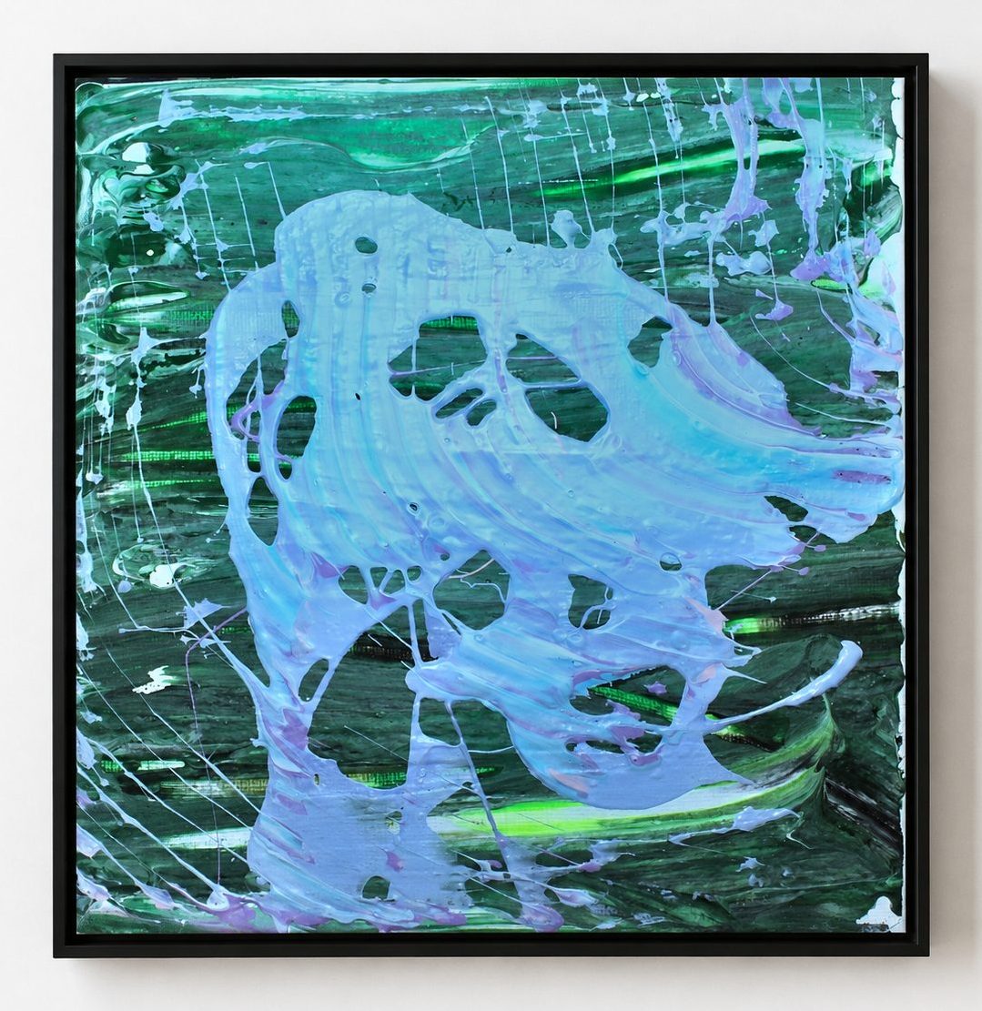 A white shape on a green ground, in a black frame