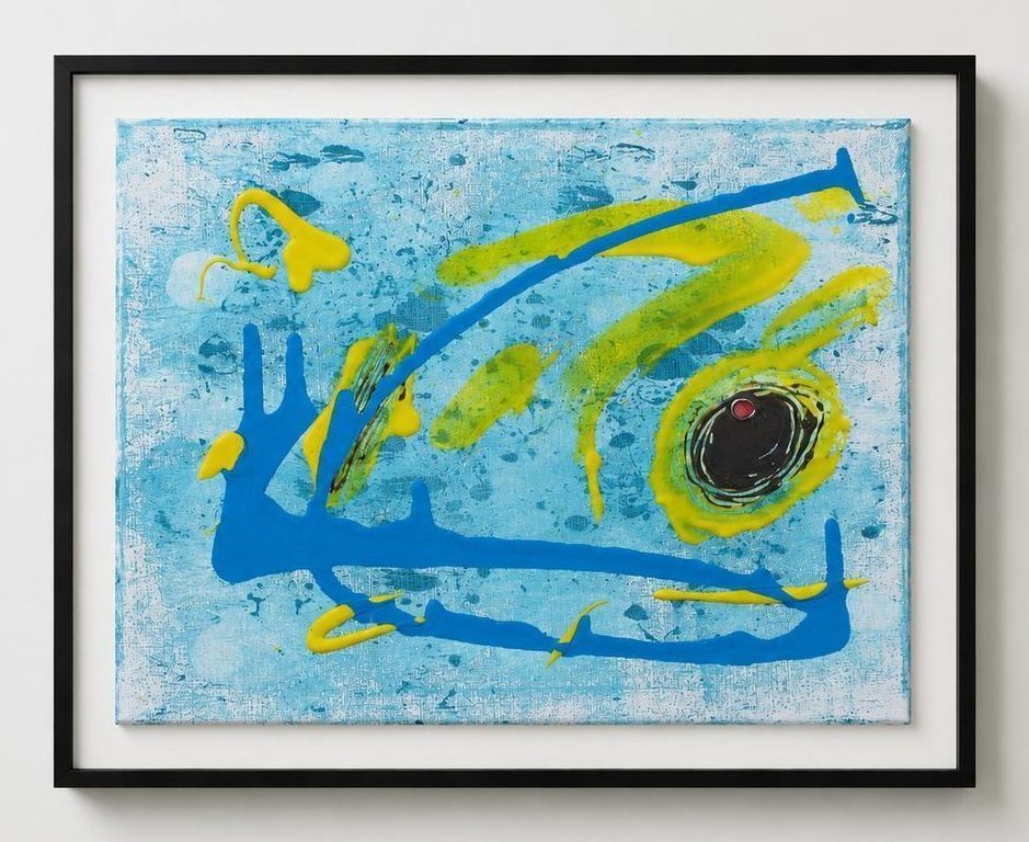 A pale blue canvas with blue and yellow lines and a dark eye, in a black frame